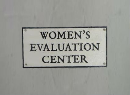 Women's evaluation centre sign